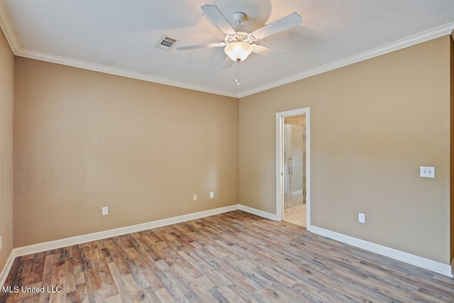 103 Cavitt Cv, Clinton, MS 39056 - empty room with baseboards, ceiling fan, ornamental molding, and wood finished floors