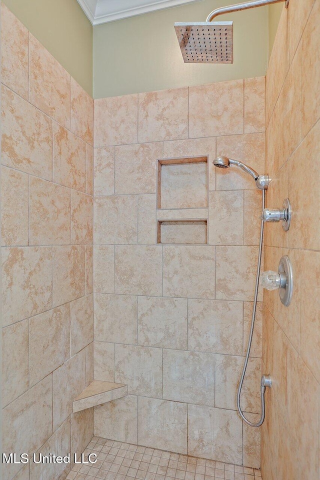 103 Cavitt Cv, Clinton, MS 39056 - bathroom featuring crown molding and tiled shower