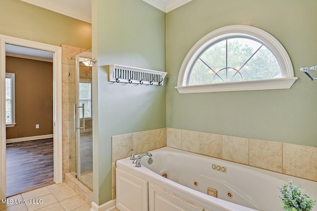103 Cavitt Cv, Clinton, MS 39056 - full bath with a stall shower, a whirlpool tub, crown molding, and tile patterned floors