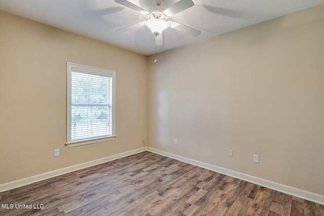 103 Cavitt Cv, Clinton, MS 39056 - empty room featuring wood finished floors, baseboards, and ceiling fan