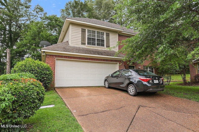 103 Cavitt Cv, Clinton, MS 39056 - traditional home with brick siding, concrete driveway, roof with shingles, and a garage