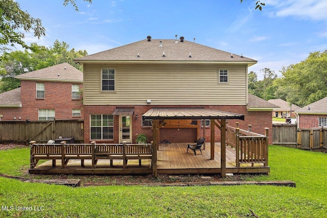 103 Cavitt Cv, Clinton, MS 39056 - rear view of property featuring a gazebo, a deck, and brick siding