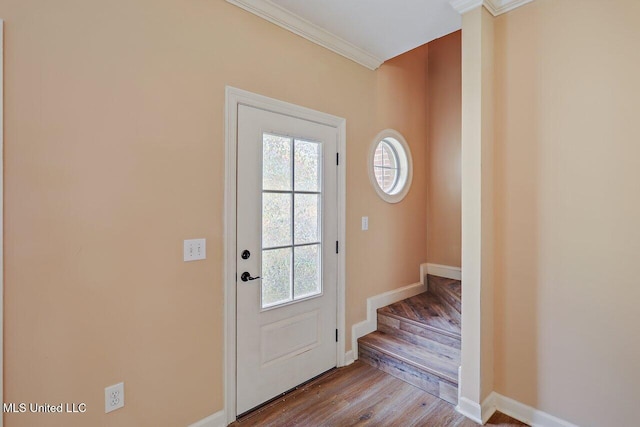103 Cavitt Cv, Clinton, MS 39056 - entryway featuring wood finished floors, ornamental molding, stairs, and baseboards