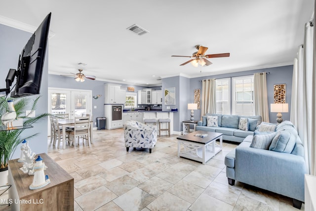 112 Vista Dr, Pass Christian, MS 39571 - living area with a ceiling fan, crown molding, plenty of natural light, and recessed lighting