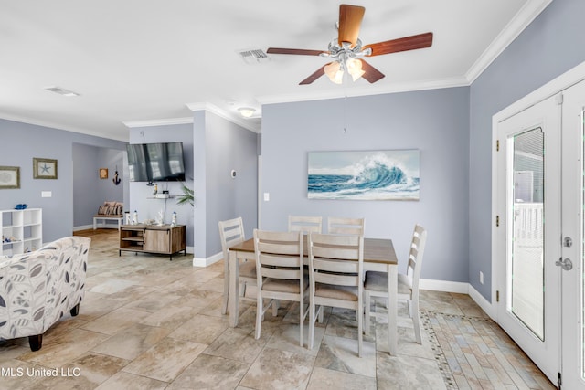 112 Vista Dr, Pass Christian, MS 39571 - dining space with ornamental molding and ceiling fan
