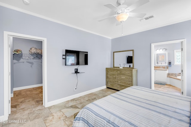 112 Vista Dr, Pass Christian, MS 39571 - bedroom with crown molding, a spacious closet, a closet, a ceiling fan, and connected bathroom