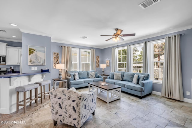 112 Vista Dr, Pass Christian, MS 39571 - living room with ornamental molding and ceiling fan
