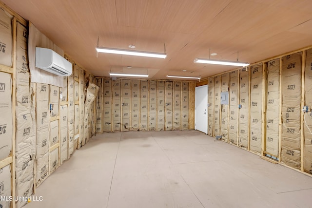 112 Vista Dr, Pass Christian, MS 39571 - below grade area with a wall mounted air conditioner and wood ceiling