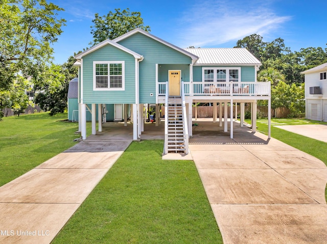 112 Vista Dr, Pass Christian, MS 39571 - beach home with a carport, driveway, and stairs