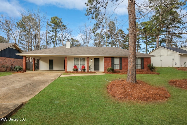 ranch-style home featuring a carport and a front lawn