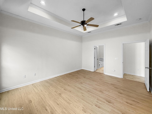 290 Geneva Blvd, Madison, MS 39110 - empty room featuring a tray ceiling, ornamental molding, a ceiling fan, light wood-type flooring, and recessed lighting