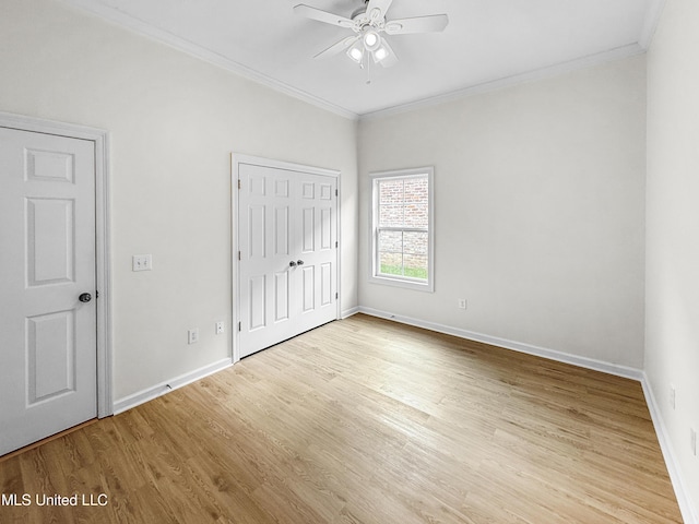290 Geneva Blvd, Madison, MS 39110 - unfurnished bedroom with crown molding, wood finished floors, a closet, and a ceiling fan