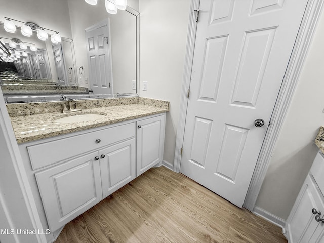 290 Geneva Blvd, Madison, MS 39110 - bathroom with vanity and wood finished floors