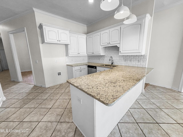 290 Geneva Blvd, Madison, MS 39110 - kitchen with a peninsula, white cabinetry, backsplash, light tile patterned floors, and light stone countertops