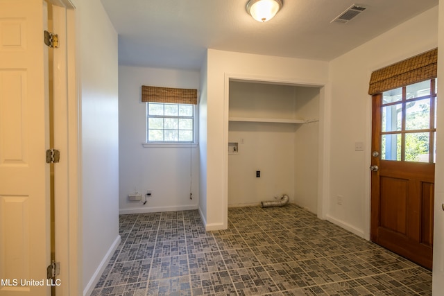 laundry room featuring plenty of natural light