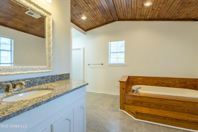 bathroom with a bathing tub, vaulted ceiling, wood ceiling, and plenty of natural light