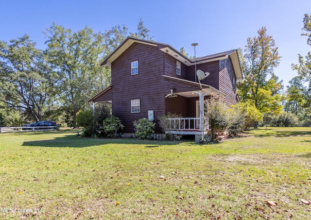 16601 Mcgregor Rd, Vancleave, MS 39565 - view of property exterior featuring a lawn