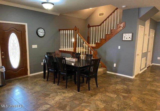6301 W Wimbledon Cv, Ocean Springs, MS 39564 - dining space with crown molding, baseboards, visible vents, and stairway