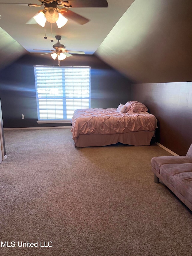 bedroom featuring lofted ceiling, carpet flooring, and ceiling fan