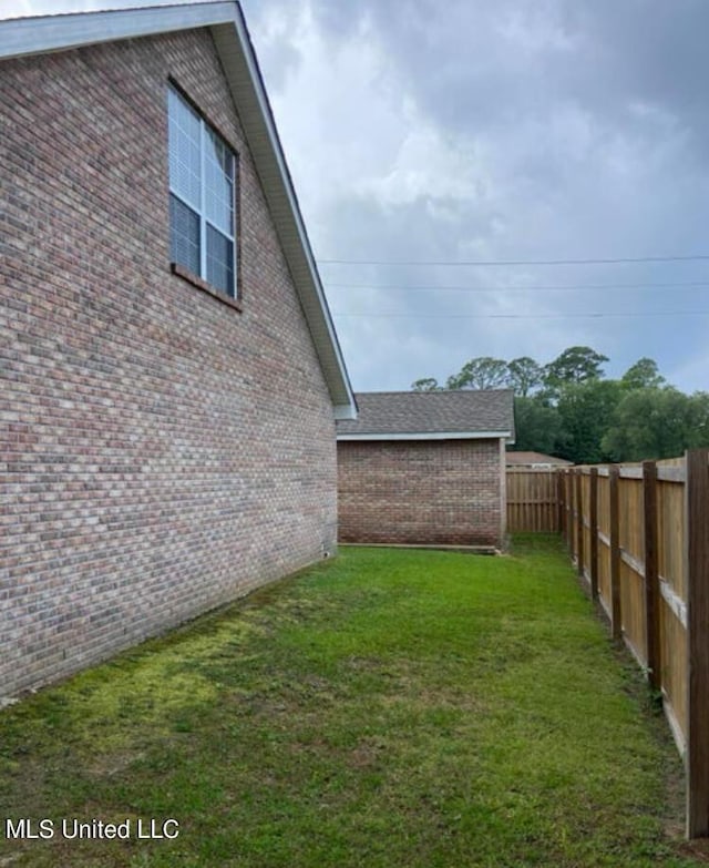 6301 W Wimbledon Cv, Ocean Springs, MS 39564 - view of yard featuring a fenced backyard