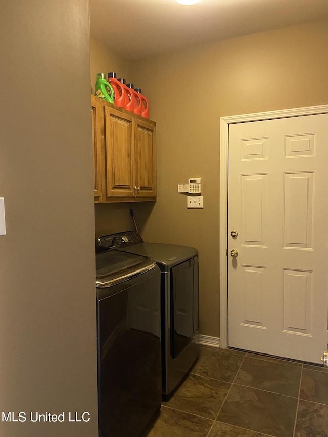 6301 W Wimbledon Cv, Ocean Springs, MS 39564 - washroom featuring cabinet space and separate washer and dryer