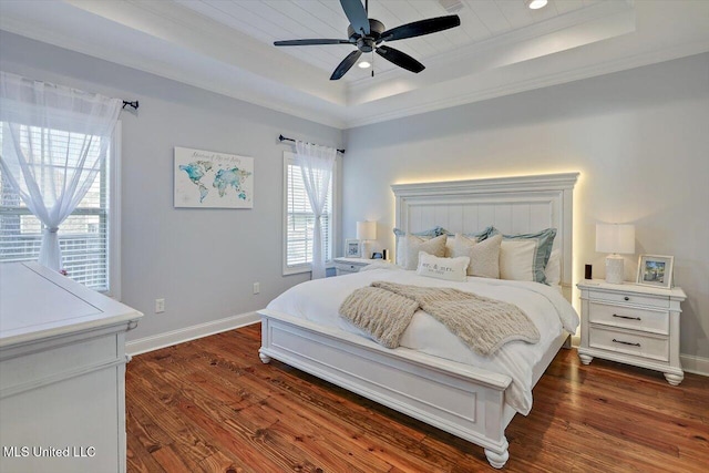 1235 Cutter Ln, Brandon, MS 39047 - bedroom featuring a tray ceiling, dark wood finished floors, ornamental molding, and ceiling fan
