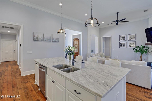 1235 Cutter Ln, Brandon, MS 39047 - kitchen with open floor plan, ornamental molding, ceiling fan, white cabinetry, and light stone countertops