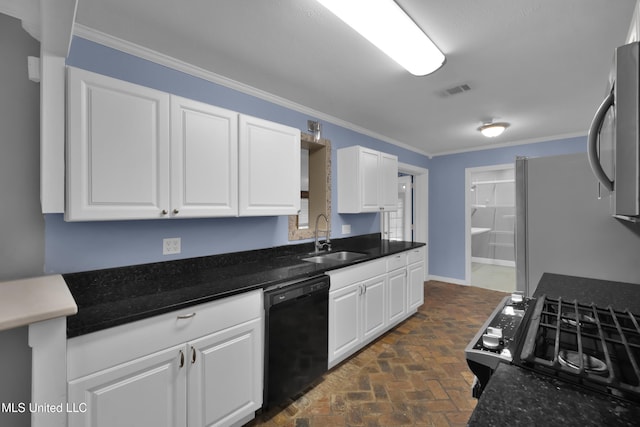 kitchen featuring brick floor, a sink, white cabinetry, black appliances, and crown molding