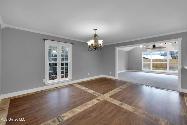 unfurnished room with a wealth of natural light, crown molding, baseboards, and wood finished floors