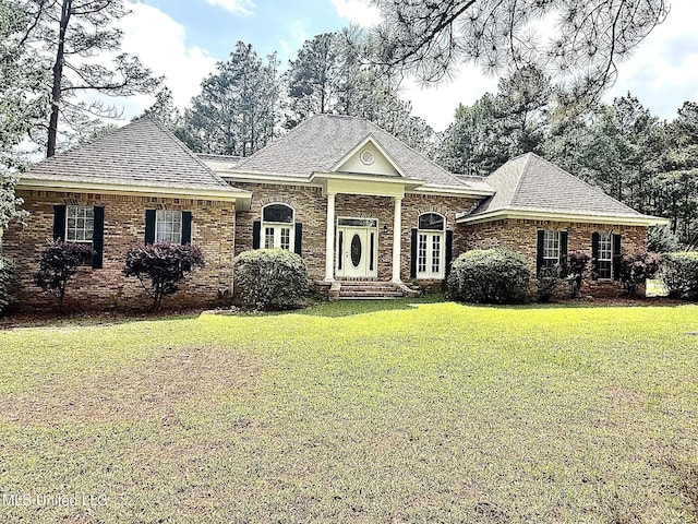 110 Frye Rd, Hattiesburg, MS 39401 - view of front of home with a front yard and roof with shingles