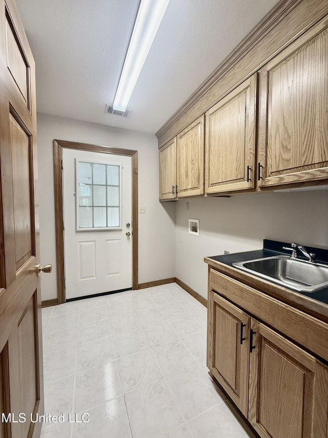 110 Frye Rd, Hattiesburg, MS 39401 - washroom with cabinet space, hookup for a washing machine, baseboards, and light tile patterned floors