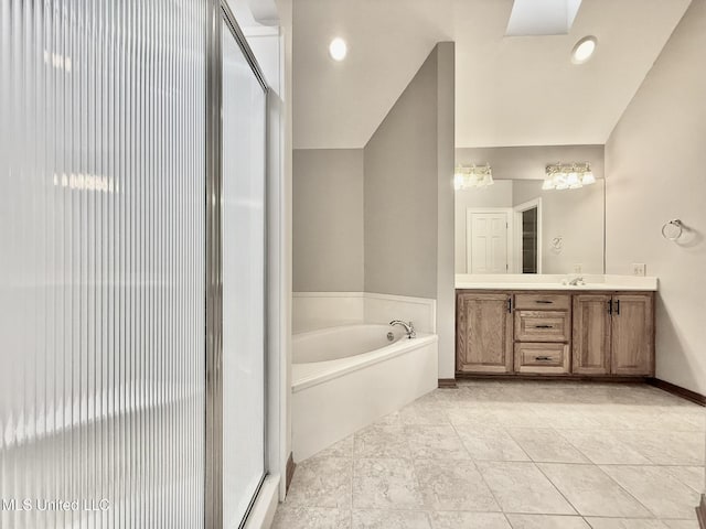 110 Frye Rd, Hattiesburg, MS 39401 - full bathroom featuring a garden tub, a stall shower, vanity, and baseboards