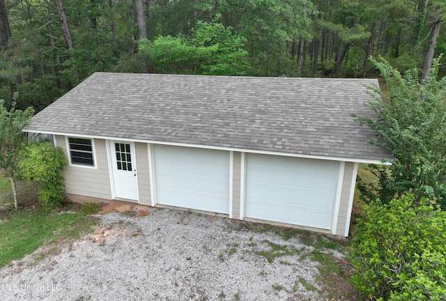 110 Frye Rd, Hattiesburg, MS 39401 - detached garage featuring a view of trees