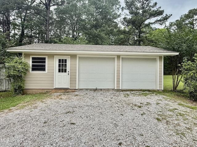 110 Frye Rd, Hattiesburg, MS 39401 - detached garage featuring view of wooded area