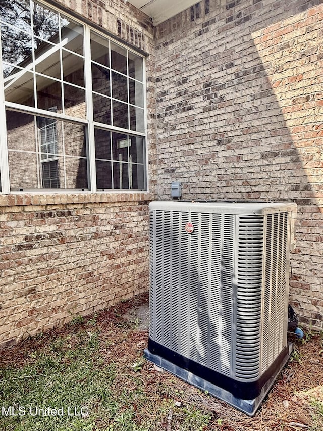 110 Frye Rd, Hattiesburg, MS 39401 - exterior view of central air condition unit, a bar, and brick siding