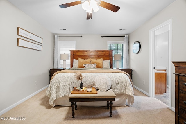 bedroom with a ceiling fan, baseboards, visible vents, and carpet