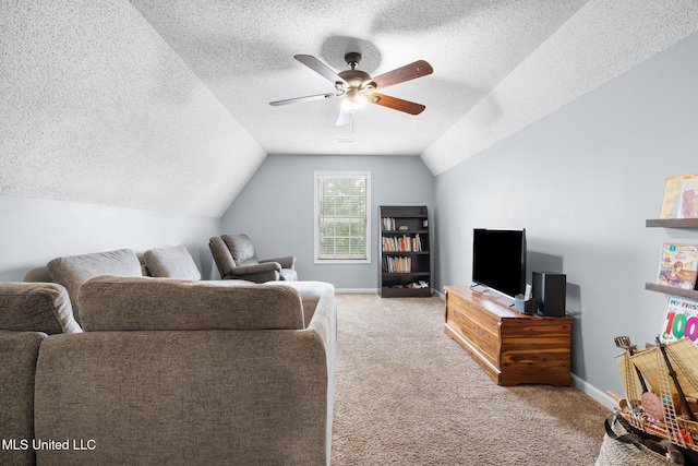 living room with a textured ceiling, carpet, ceiling fan, and vaulted ceiling