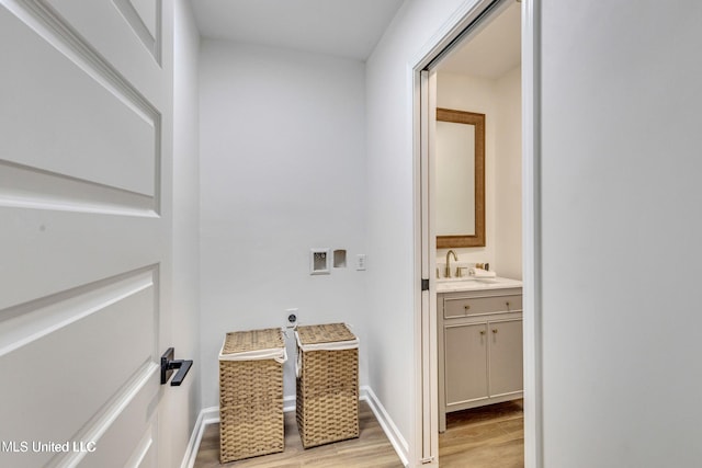 bathroom with vanity and hardwood / wood-style floors