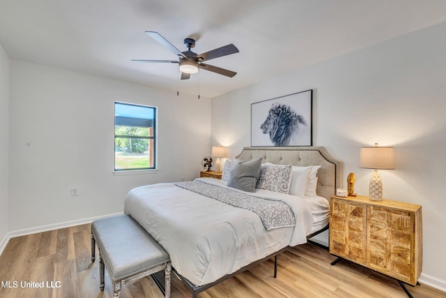 bedroom featuring wood-type flooring and ceiling fan