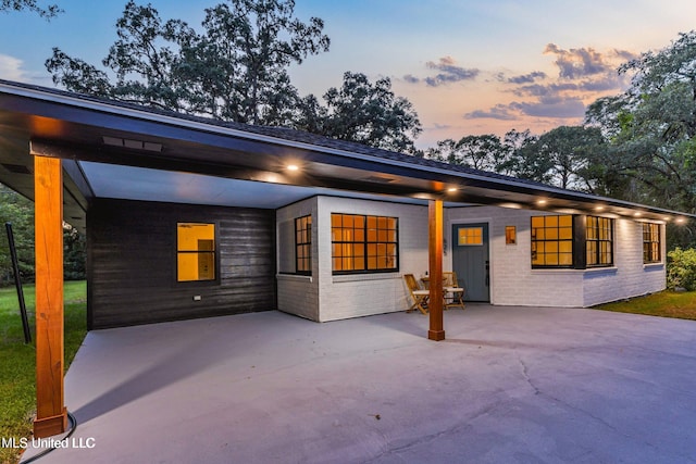 view of front of home featuring a patio area