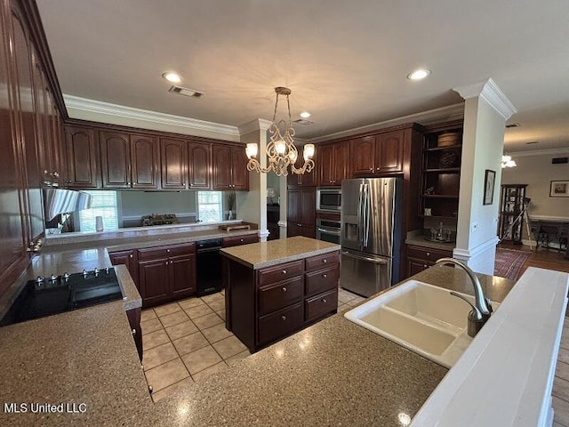 9053 Castalian Springs Rd, Durant, MS 39063 - kitchen with crown molding, a chandelier, appliances with stainless steel finishes, and a sink