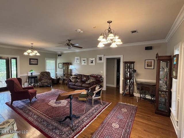 9053 Castalian Springs Rd, Durant, MS 39063 - living area with crown molding, ceiling fan with notable chandelier, wood finished floors, and visible vents
