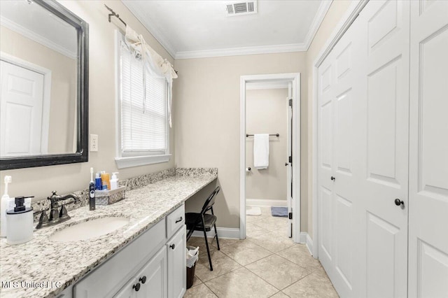 78 Bayou Cir, Gulfport, MS 39507 - bathroom featuring tile patterned flooring, vanity, ornamental molding, and baseboards