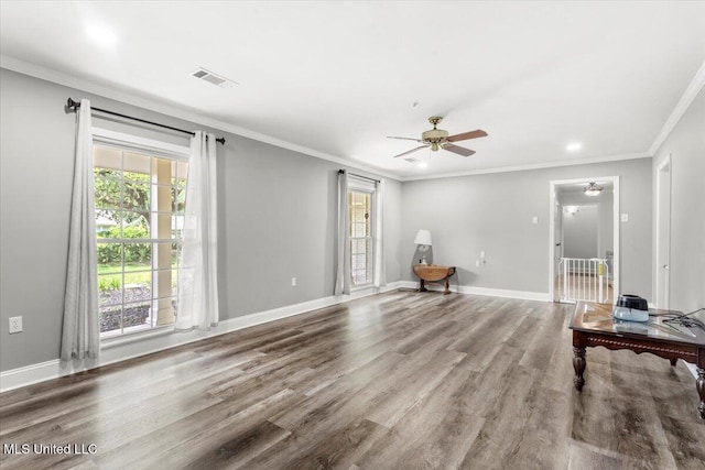 78 Bayou Cir, Gulfport, MS 39507 - living area with wood finished floors, ceiling fan, ornamental molding, and baseboards