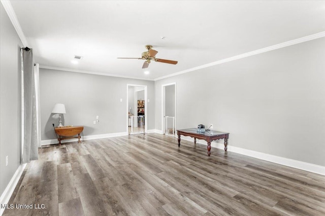 78 Bayou Cir, Gulfport, MS 39507 - unfurnished room with ornamental molding, wood finished floors, a ceiling fan, and baseboards