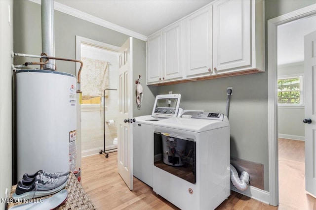 78 Bayou Cir, Gulfport, MS 39507 - laundry area with water heater, washer and dryer, cabinet space, light wood finished floors, and ornamental molding