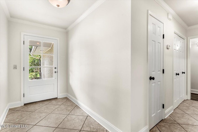 78 Bayou Cir, Gulfport, MS 39507 - doorway to outside featuring crown molding, light tile patterned flooring, and baseboards