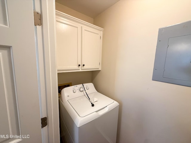 999 Hamakua St, Diamondhead, MS 39525 - washroom featuring washer / clothes dryer, cabinet space, and electric panel