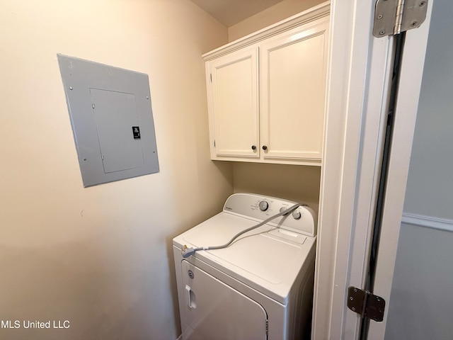 999 Hamakua St, Diamondhead, MS 39525 - laundry area featuring electric panel, cabinet space, and washing machine and clothes dryer