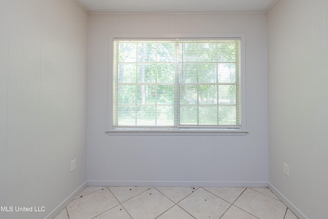 828 Briarwood Dr, Jackson, MS 39211 - unfurnished room with plenty of natural light, baseboards, and light tile patterned floors